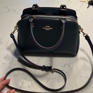 Coach handbag with crossbody strap